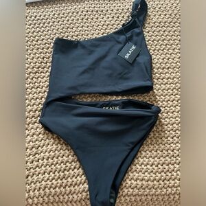 Skatie Nicole One Piece. Size Large. Black. Never worn. New With Tags.